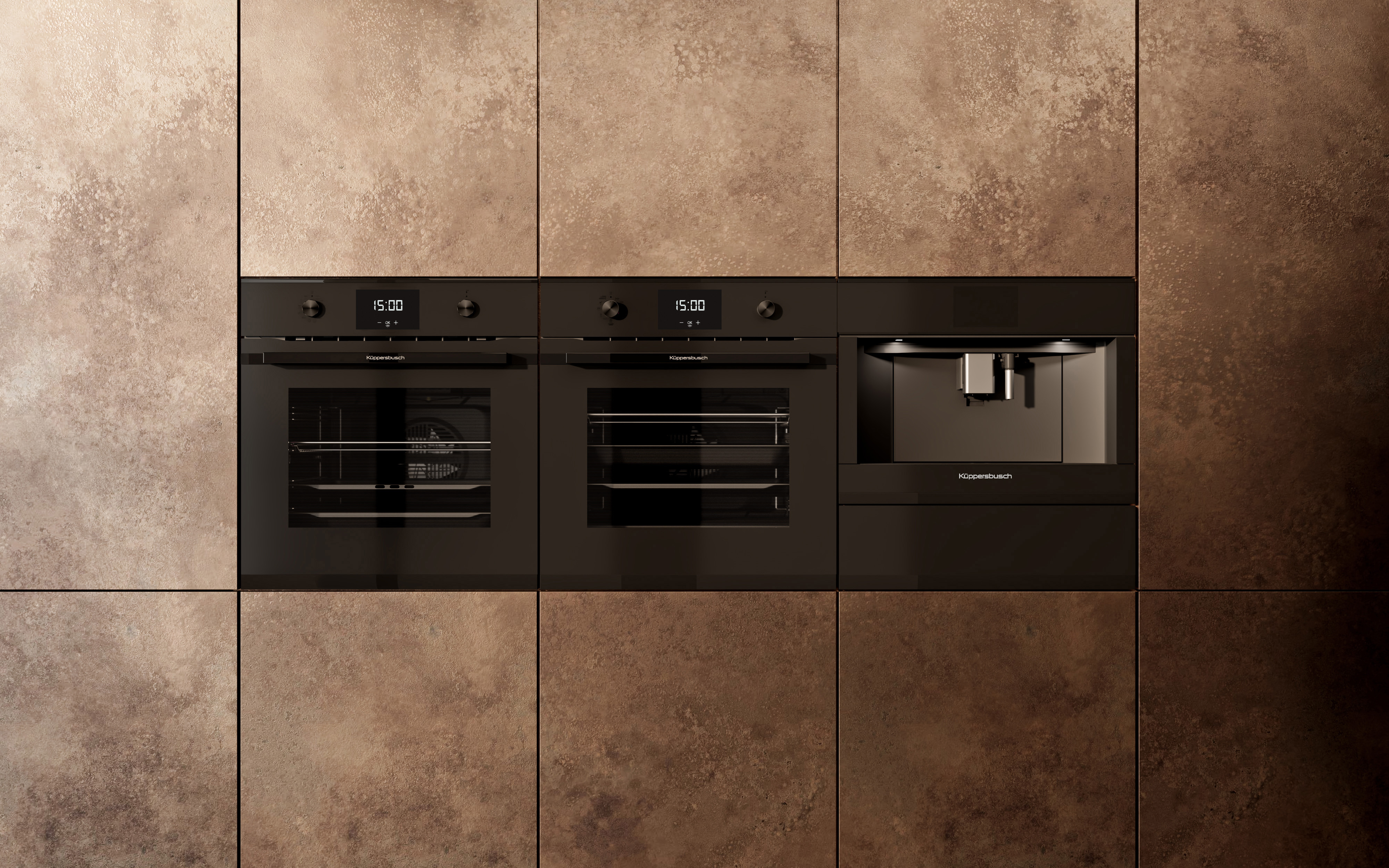 3 Küppersbusch Einbaugeräte nebeneinander im MattBlack Design in rostroter Küchenfront